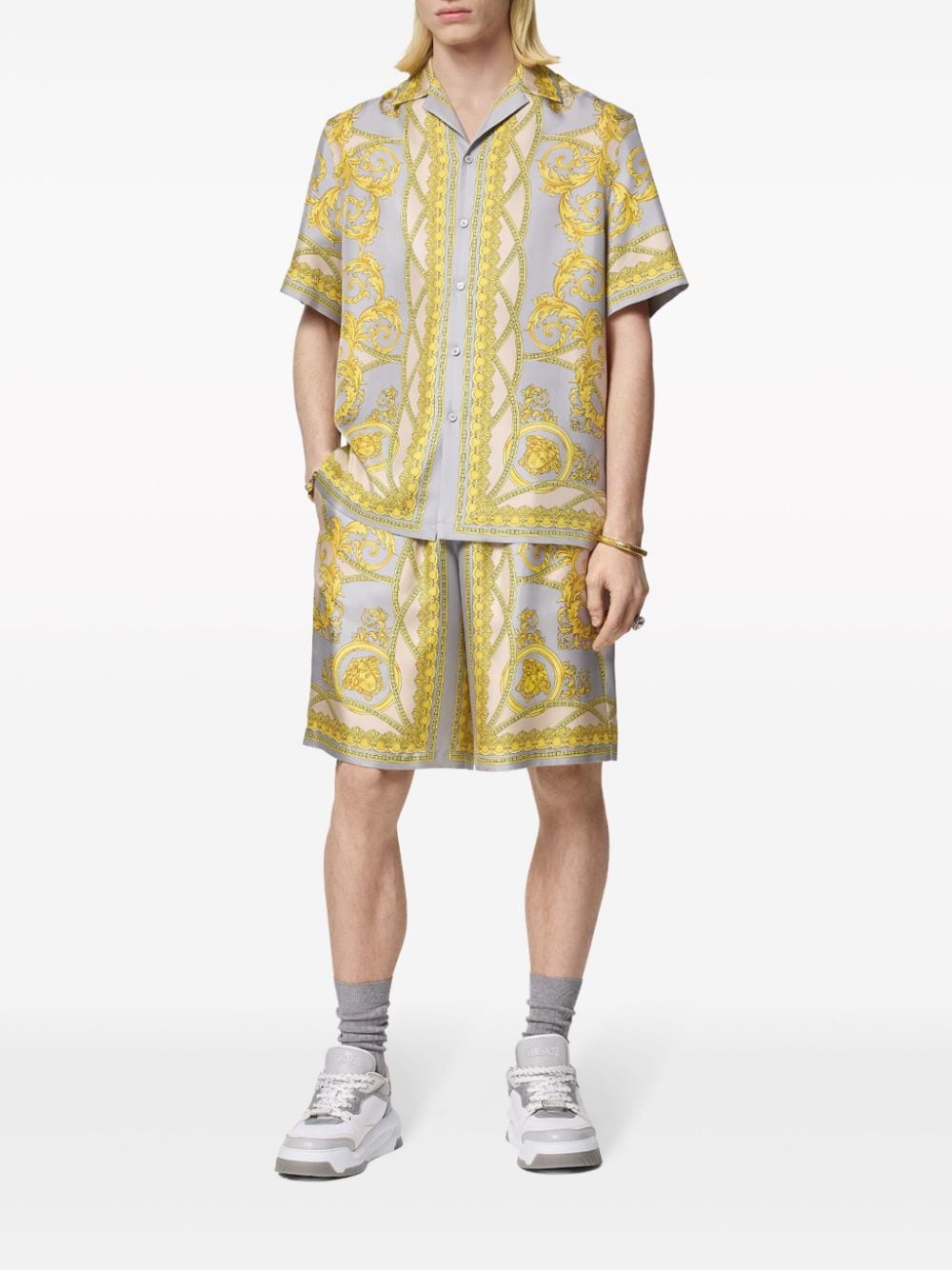 Златни шорти Versace