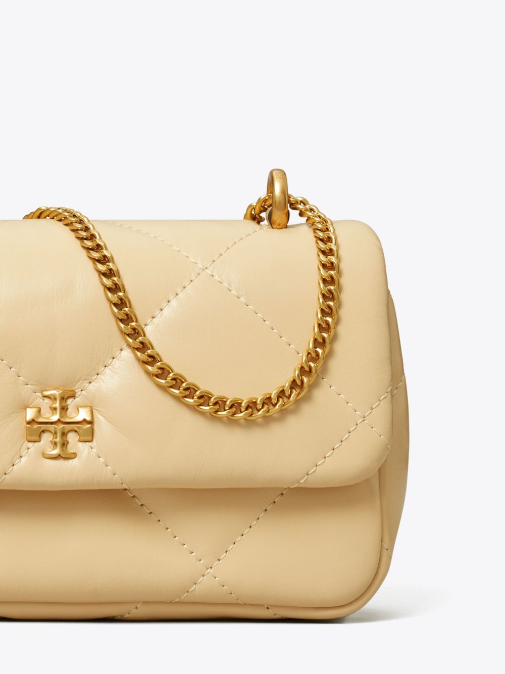 Мини чанта Tory Burch Kira с капак и трапецовиден капитониран детал