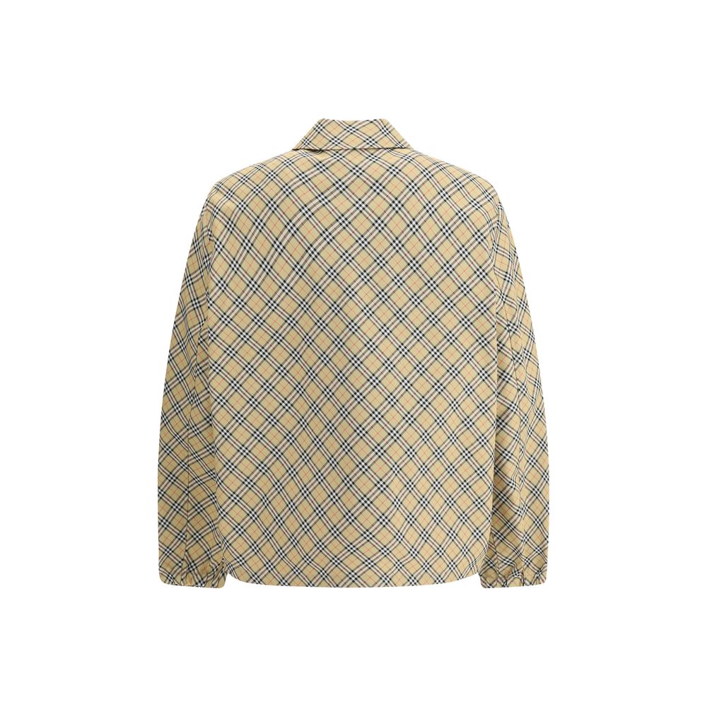 Бежеви полиестерни якета и палта на Burberry