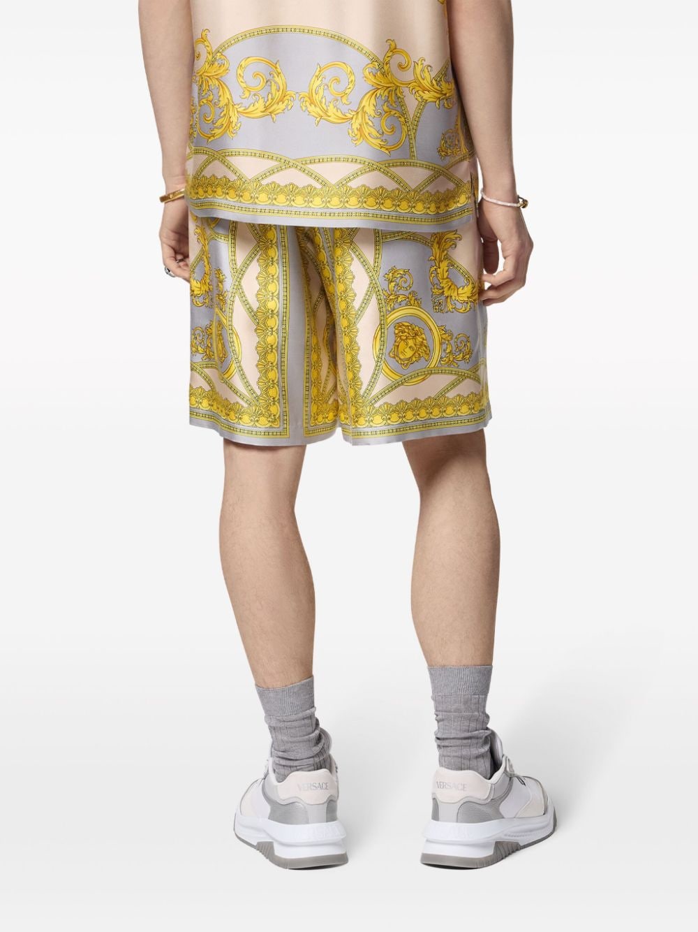 Златни шорти Versace