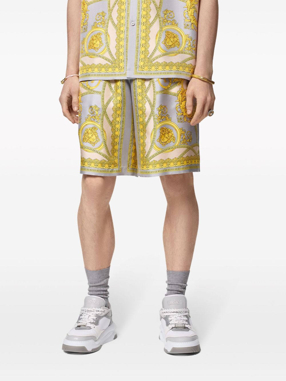Златни шорти Versace